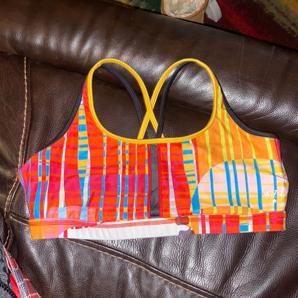 Peloton multicolor and reversible never wore. Too big on me